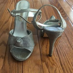 Silver high heels. Brand:Caparros